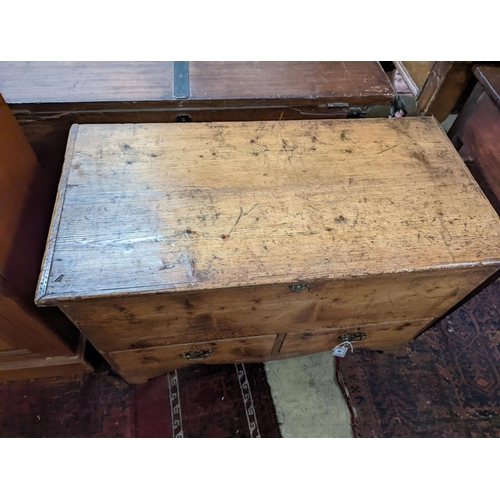 50 - An early 19th century pine two drawer mule chest, length 90cm, depth 45cm, height 60cm