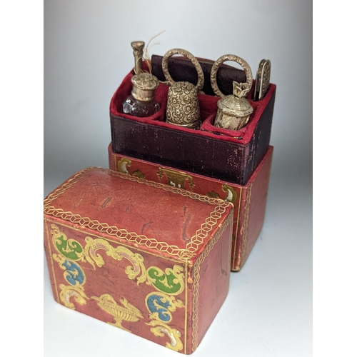 501 - A Victorian lady’s seven-piece necessaire, with white metal mounts, in Morocco leather case, 10.5cm.... 