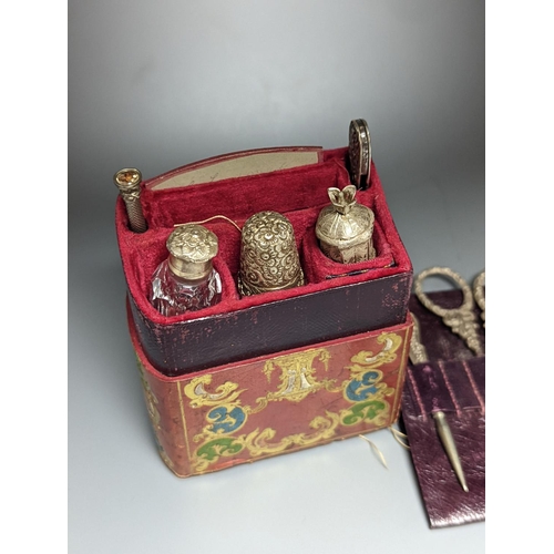 501 - A Victorian lady’s seven-piece necessaire, with white metal mounts, in Morocco leather case, 10.5cm.... 