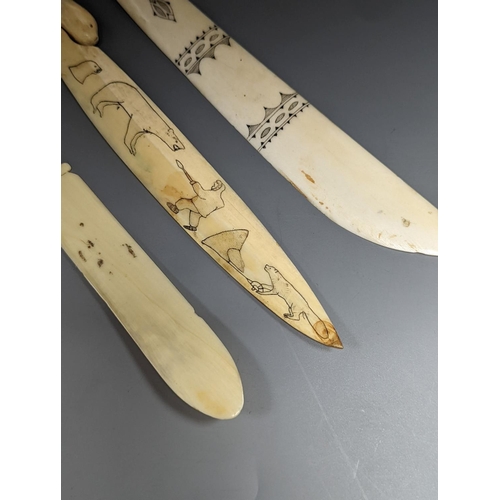 505 - A 19th century Scrimshaw seal paperknife, 22cm., and two other engraved bone paperknives... 