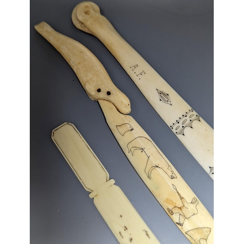 505 - A 19th century Scrimshaw seal paperknife, 22cm., and two other engraved bone paperknives... 