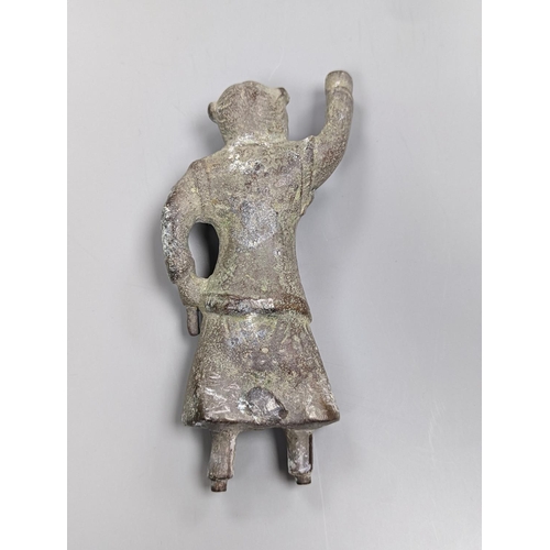 506 - A Chinese archaistic bronze figure, 13cm.