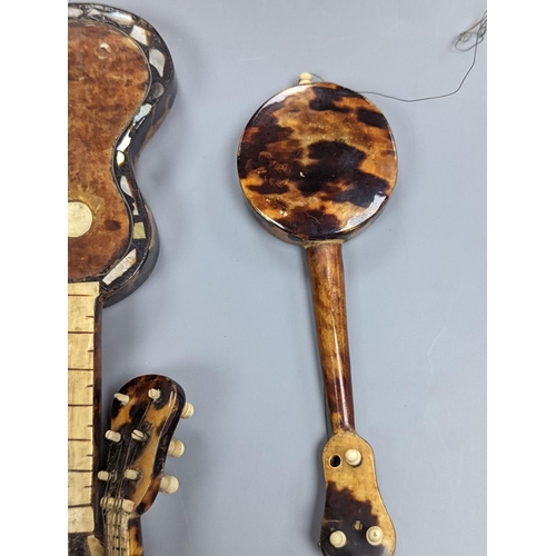 507 - Five 19th century tortoiseshell miniature stringed instruments, longest 20cm.