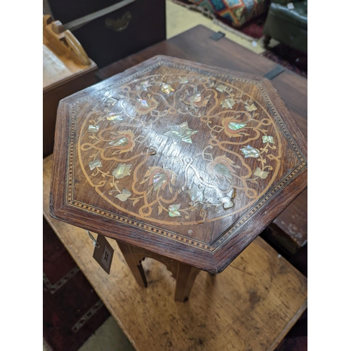 51 - A Moorish mother of pearl and marquetry inlaid hexagonal occasional table, width 29cm, height 50cm... 