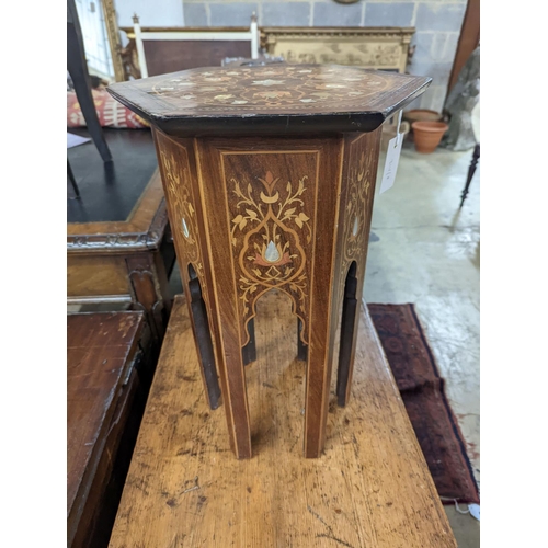 51 - A Moorish mother of pearl and marquetry inlaid hexagonal occasional table, width 29cm, height 50cm... 