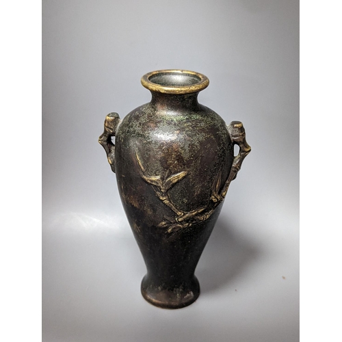 510 - A Chinese bronze vase, 12cm., and an Islamic pierced brass lamp