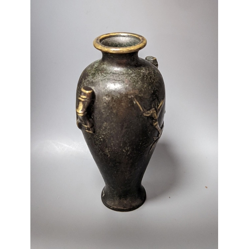 510 - A Chinese bronze vase, 12cm., and an Islamic pierced brass lamp