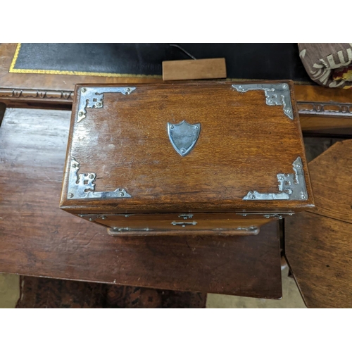 52 - A late Victorian metal mounted oak smoker's box, width 34cm, depth 20cm, height 29cm