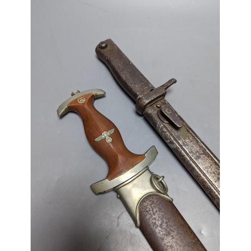 530 - A Third Reich SA dagger within sheath, blade 22cm., and a bayonet within scabbard