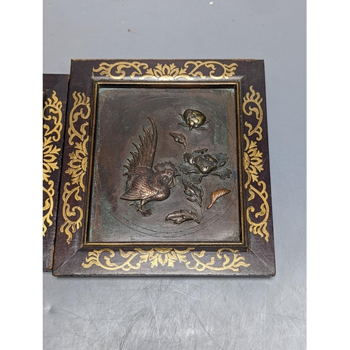 534 - A pair of Japanese mixed metal chicken panels, in gilded wood frames, 17cm. high