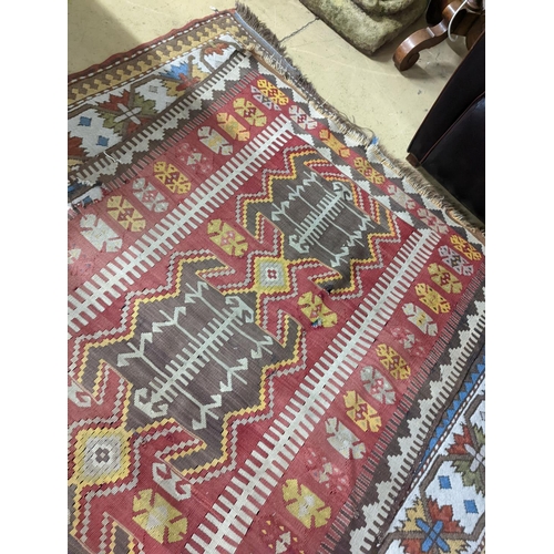 57 - A Kilim polychrome flatweave runner, 380 x 118cm (holed)