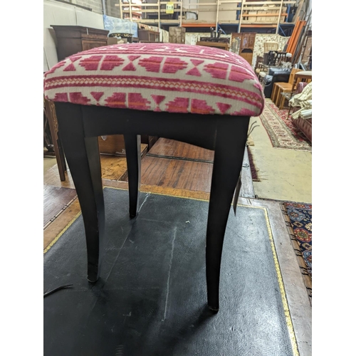 58 - A square ebonised footstool upholstered in Andrew Martin fabric, width 32cm, height 50cm... 