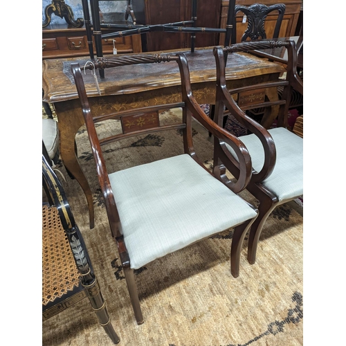 65 - A pair of Regency style brass inlaid mahogany elbow chairs, width 48cm, depth 48cm, height 88cm... 