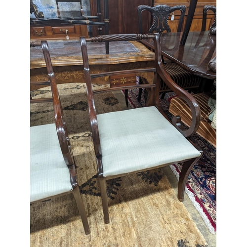 65 - A pair of Regency style brass inlaid mahogany elbow chairs, width 48cm, depth 48cm, height 88cm... 