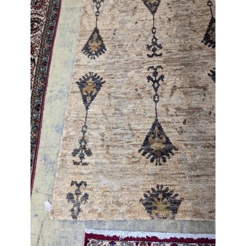 66 - A contemporary Ikat design Jute carpet, 300 x 240cm