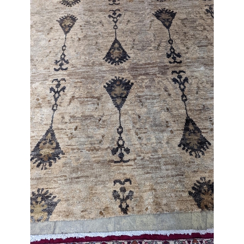 66 - A contemporary Ikat design Jute carpet, 300 x 240cm