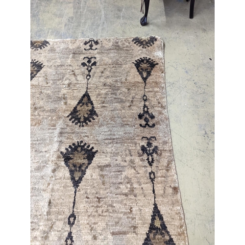 66 - A contemporary Ikat design Jute carpet, 300 x 240cm