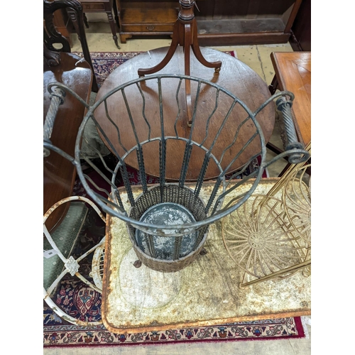 68 - A rattan and wirework stick stand, height 63cm, together with one other folding stand