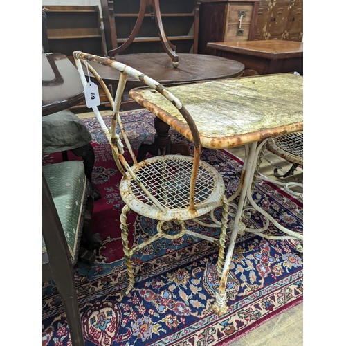 69 - A rectangular French wrought iron garden table, length 80cm, depth 49cm, height 70cm and two chairs... 