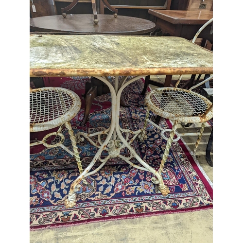 69 - A rectangular French wrought iron garden table, length 80cm, depth 49cm, height 70cm and two chairs... 