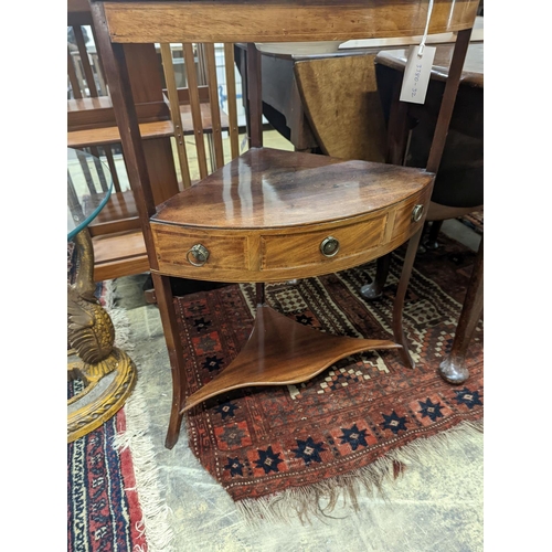 74 - A George III mahogany bow front three tier corner washstand, width 58cm, depth 38cm, height  99cm wi... 