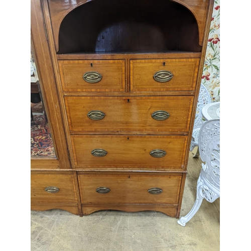 77 - An Edwardian satinwood banded mahogany compactum wardrobe, length 136cm, depth 56cm, height 210cm... 