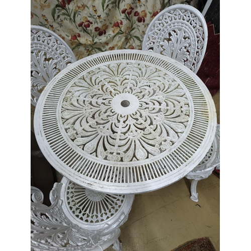 78 - A Victorian style painted aluminium circular garden table, diameter 80cm, height 70cm and four chair... 