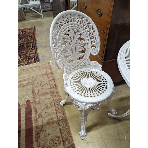 78 - A Victorian style painted aluminium circular garden table, diameter 80cm, height 70cm and four chair... 