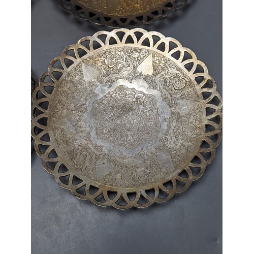 803 - A set of six Persian white metal circular shallow dishes, with pierced borders, 16.3cm, 972 grams.... 