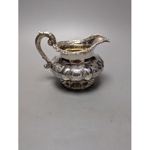 808 - A Victorian embossed silver cream jug, J.E. Terry & Co, London, 1838, height 10.9cm,9.5oz.... 