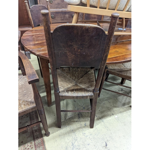 81 - A set of six Arts & Crafts oak chairs, including a pair of carvers, in the Glasgow School manner by ... 