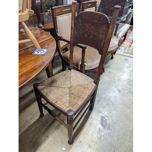 81 - A set of six Arts & Crafts oak chairs, including a pair of carvers, in the Glasgow School manner by ... 