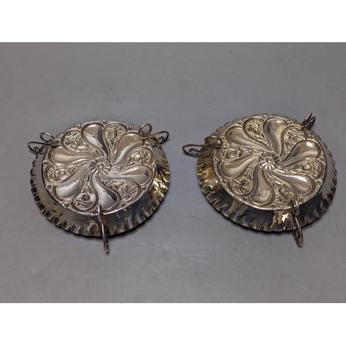 825 - A pair of late Victorian repousse silver tri-handled shallow nut dishes, Vale Brothers & Serman, Bir... 