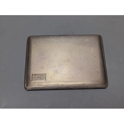 828 - A George V engine turned silver cigarette case, 11.3cm, together with an 800 standard white metal mo... 