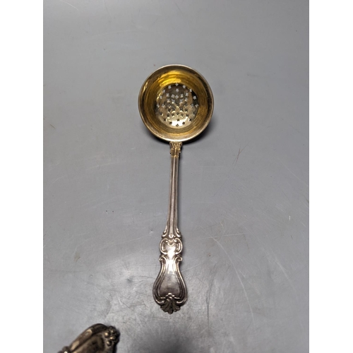 832 - A late 19ty century Russian 84 zolotnik sifter ladle, assay master Ludvig Zug, 187?, 18.7cm, and a V... 