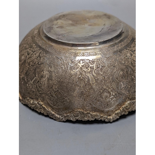 836 - A Persian engraved white metal bowl, diameter 17.9cm and a similar stand or plate, 22cm, 20oz.... 