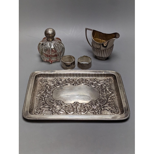 842 - A late Victorian repousse silver rectangular dressing table tray, Joseph Gloster, Birmingham, 1899, ... 