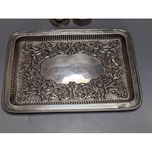 842 - A late Victorian repousse silver rectangular dressing table tray, Joseph Gloster, Birmingham, 1899, ... 