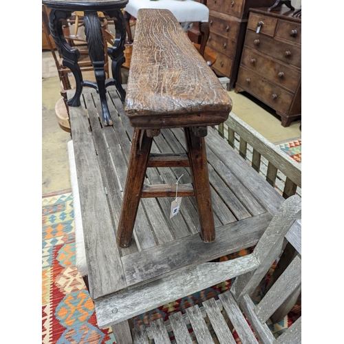 85 - A Chinese elm bench, length 114cm, depth 29cm, height 51cm together with a circular ebonised vase st... 