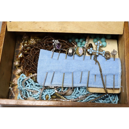 885 - Assorted costume jewellery including gem set stick pins, hat pins, necklaces etc.