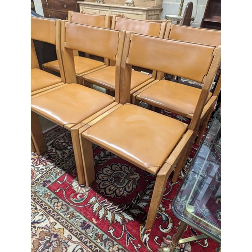 89 - A set of eight mid century design walnut and tan leather dining chairs, width 48cm, depth 44cm, heig... 