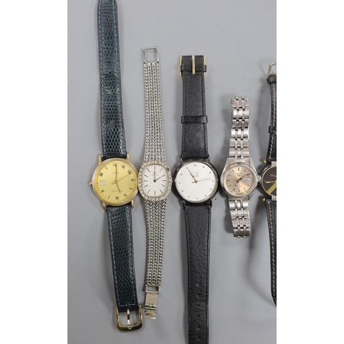 890 - A Dunhill Swiss quartz wrist watch and nine other assorted lady's and gentleman's modern wrist watch... 