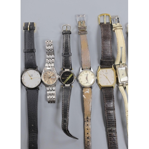 890 - A Dunhill Swiss quartz wrist watch and nine other assorted lady's and gentleman's modern wrist watch... 