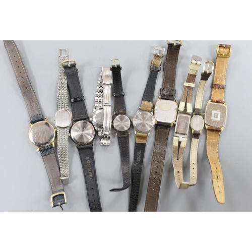 890 - A Dunhill Swiss quartz wrist watch and nine other assorted lady's and gentleman's modern wrist watch... 