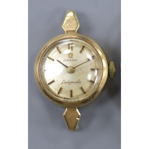 900 - A gentleman's 9ct gold watch Longines manual wind wrist watch (no strap) and a lady's yellow metal O... 