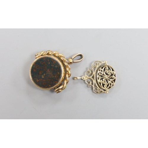 908 - A Victorian gold, bloodstone and carnelian set spinning fob, 37mm and a later yellow metal and chalc... 