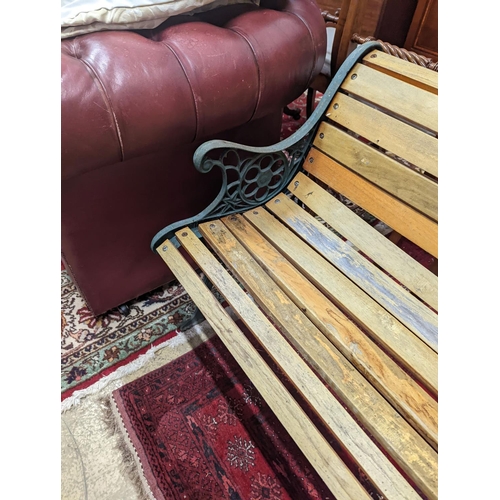 94 - A Victorian style painted aluminium slatted garden bench, length 127cm, depth 55cm, height 67cm... 