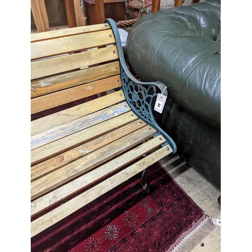 94 - A Victorian style painted aluminium slatted garden bench, length 127cm, depth 55cm, height 67cm... 