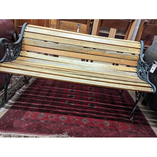 94 - A Victorian style painted aluminium slatted garden bench, length 127cm, depth 55cm, height 67cm... 