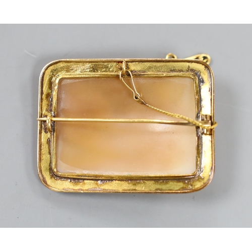 945 - A yellow metal amounted rectangular cameo shell brooch, carved with figures cherubs and chariot, 50m... 